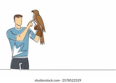 Single one line drawing eagle perched on hand of man. One of many large, thick billed, large footed birds of prey. Strong talons. Claws. Man Holding Bird. Continuous line design graphic illustration