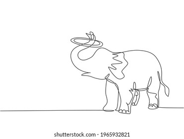Single one line drawing of an elephant performs a circus show by turning a circle using its trunk. Cute animal which is very attractive. Modern continuous line draw design graphic vector illustration.