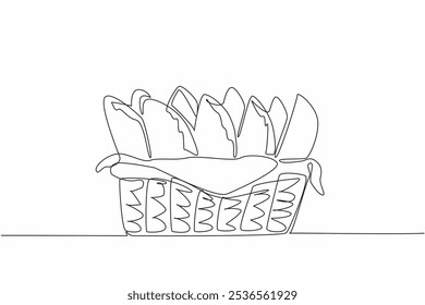 Single one line drawing empanadas neatly arranged in rattan wicker with napkins. Delivery package in the form of traditional food. National Empanada Day. Continuous line design graphic illustration