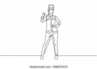 Single one line drawing of female welder stands with a thumbs-up gesture and the face shield is removed ready to work in his iron workshop. Continuous line draw design graphic vector illustration