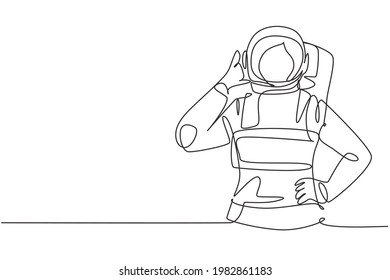 Single one line drawing female astronaut with call me gesture wearing spacesuits to explore outer space in search mysteries of universe. Modern continuous line draw design graphic vector illustration