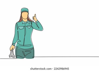 Single one line drawing of female mechanic with a thumbs-up gesture and holding the wrench works to fix a broken car engine in garage. Modern continuous line draw design graphic vector illustration