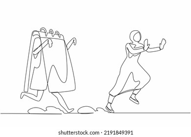 Single one line drawing fright Arab businesswoman being chased by calendar. Female employee afraid with project schedule deadline. Minimal metaphor. Continuous line design graphic vector illustration