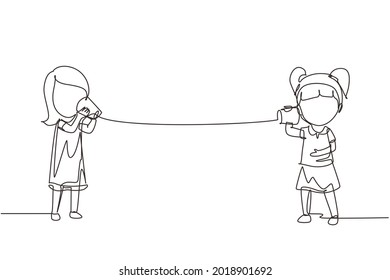 Single one line drawing girls speaking by tin can telephone. Two friends playing in phone with self made speech transmitting device, kids have fun speaking. Continuous line draw design graphic vector