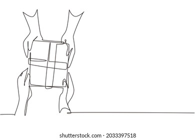 Single one line drawing gives gift box presents laid on wooden table. Romantic surprise. Birthday presents cardboard box with ribbon. Modern continuous line draw design graphic vector illustration