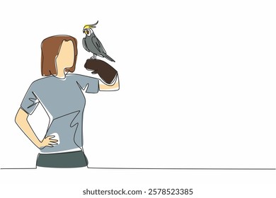 Single one line drawing grey cockatiel perched on hand of woman. Bird with characteristic crest on its head. A gentle and loving animal. Woman Holding Bird. Continuous line design graphic illustration