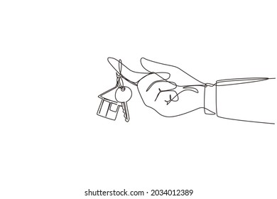 Single one line drawing hand hold a key of house or apartment. Real estate. Man hand holding key from house isolated on white. Buying the house. Continuous line draw design graphic vector illustration