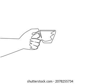 Single one line drawing hand holds a cup of hot coffee. Hand holding cup of tea or coffee. Coffee break. For restaurant or cafe drink menu. Continuous line draw design graphic vector illustration