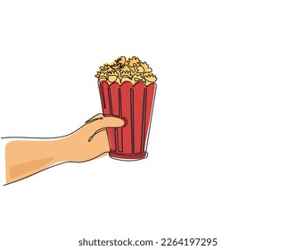 Single one line drawing hand holding popcorn. Human hands holding popcorn box. I love movie cinema icon. Watching movie concept in flat design style. Modern continuous line draw design graphic vector