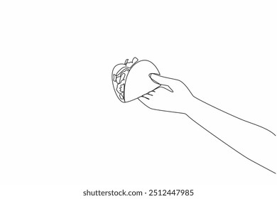 Single one line drawing hand holding taco from side. Offering typical Texas-Mexican snack foods. Traditional food. Spicy flavor. National Crunchy Taco Day. Continuous line design graphic illustration