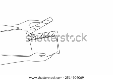 Single one line drawing the hand is holding an open clapper. Filmmaking process. Useful tool for film editors. Synchronization. National Screenwriters Day. Continuous line design graphic illustration