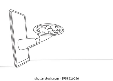 Single one line drawing Hands out of smartphone screen with tray open to serve pizza. Order food digitally. Online delivery service concept. Continuous line draw design graphic vector illustration