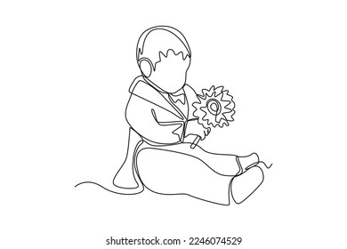 Single one line drawing handsome little boy sitting on the floor and holding flowers with a good smell. Wedding Concept. Continuous line draw design graphic vector illustration.