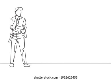 Single one line drawing handyman stands with call me gesture and tools such as pliers, screwdriver, hammer that is placed on work shirt. Modern continuous line draw design graphic vector illustration