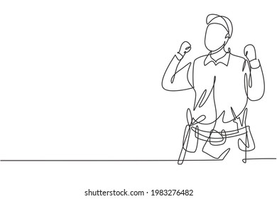 Single one line drawing handyman with celebrate gesture ready to work on repairing the damaged part of house. Professional work concept. Modern continuous line draw design graphic vector illustration