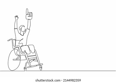 Single one line drawing happy disability young man in wheelchair celebrating winning of football team.  soccer fan wheelchair user. Games championship. Continuous line design graphic vector