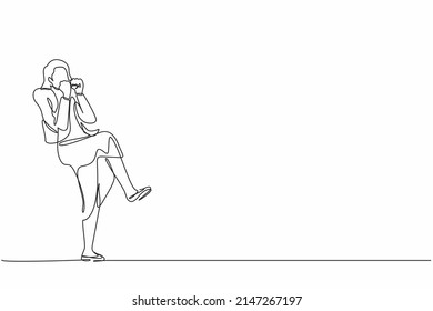 Single one line drawing happy businesswoman standing with 
fold one leg and do the yes gesture with both hands. Office worker celebrate success of company project. Continuous line draw design vector