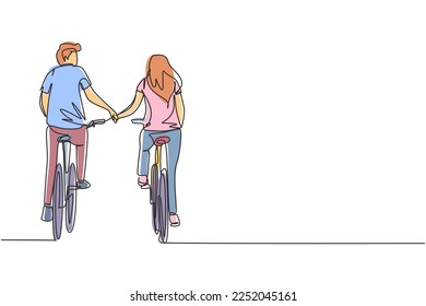 Single one line drawing happy couple ride bicycles in meadow back to camera and holding hands. Young man and woman in love. Happy romantic married couple. Continuous line draw design graphic vector