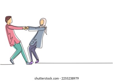Single one line drawing happy Arabic boy and girl dancing on the floor at home. Romantic young wedding couple holding hands and spinning around. Continuous line draw design graphic vector illustration