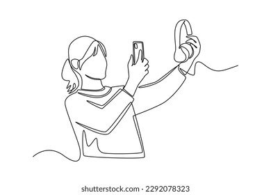 Single one line drawing happy girl share photo of her favorite item with smartphone. Social media concept. Continuous line draw design graphic vector illustration.