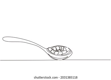 Cápsulas de hierbas de una sola línea dibujando en cuchara de madera. Medicina a base de hierbas en cápsulas de albahaca dulce. Cápsula de vitamina en una cuchara de madera. Ilustración de líneas continuas moderna de diseño gráfico vectorial