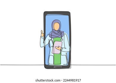 Single one line drawing hijab female doctor comes out of smartphone screen while making thumbs up gesture. Online medical consultation. Modern continuous line draw design graphic vector illustration