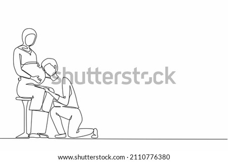 Single one line drawing husband kneel down and listening to his Arabian pregnant wife belly, expecting new born baby. Man hugs pregnant woman. Continuous line draw design graphic vector illustration