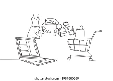 Single one line drawing laptop and shopping cart with products purchased online. E-commerce and digital marketing. Order to cart concept. Modern continuous line draw design graphic vector illustration