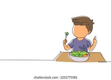 Single one line drawing little boy eating fresh vegetable salad and showing thumb up sign. Child eating salad. Healthy food for kids. Modern continuous line draw design graphic vector illustration
