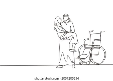 Single one line drawing loving Arab son took his old disabled mother from wheelchair carrying her in his arms. Happy senior lady in hugs of her strong child. Continuous line draw design graphic vector