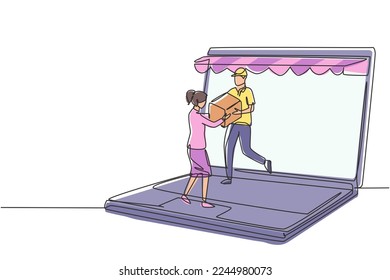 Single one line drawing male courier comes out of canopy laptop screen and gives package box to female customer. Fast respond delivery. Modern continuous line draw design graphic vector illustration