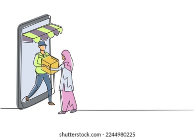 Single one line drawing male courier comes out of giant smartphone screen with canopy and gives package box to hijab female customer. Modern continuous line draw design graphic vector illustration