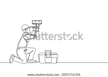 Single one line drawing male plumber in overall is installing water heater or boiler. Home repair, maintenance and plumbing services. Handyman concept. Continuous line draw design vector illustration