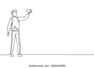 Single one line drawing man making selfie with smartphone. Travel male with backpack taking selfie. Tourism nature backpacking or trekking trip. Continuous line draw design graphic vector illustration