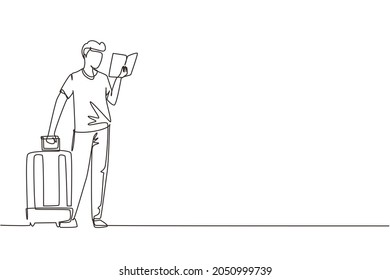Single one line drawing man reading textbook. Male student standing with open book in hands and suitcase. Enthusiastic reader for educational and hobby. Continuous line draw design vector illustration