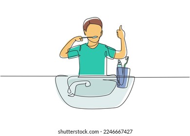 Single one line drawing man brushing his teeth with thumbs up gesture. Routine habits for cleanliness, health, freshness of mouth and teeth. Continuous line draw design graphic vector illustration
