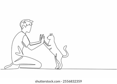 Single one line drawing a man in casual clothes sitting on the floor giving a high five to a cat. Very familiar with beloved pets. National High Five Day. Continuous line design graphic illustration