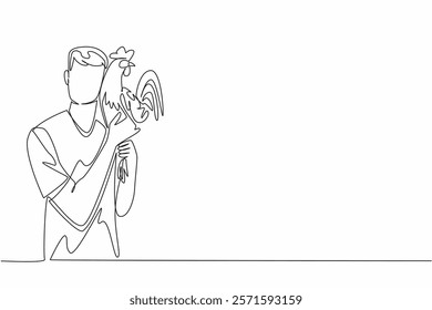 Single one line drawing a man in casual clothes lifts rooster and puts it to cheek. Keep the chicken in good mood. International Respect for Chickens Day. Continuous line design graphic illustration