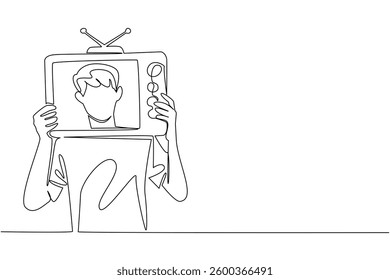 Single one line drawing a man in casual clothes holding an old television made of cardboard. Acting funny to entertain. Old technology. Inside Television. Continuous line design graphic illustration
