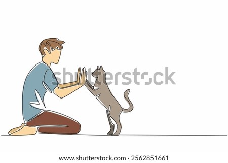 Single one line drawing a man in casual clothes sitting on the floor giving a high five to a cat. Very familiar with beloved pets. National High Five Day. Continuous line design graphic illustration