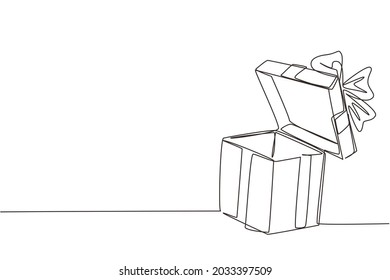 Single one line drawing open white gift box with ribbon and bow. Greeting present package. Decorative gift or cardboard box with bow. Modern continuous line draw design graphic vector illustration