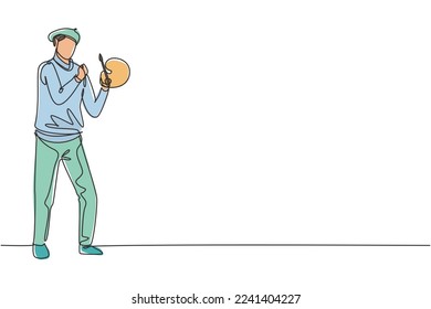 Single one line drawing painter stands with celebrate gesture using a hat and painting tools to produce artwork in his workshop studio. Modern continuous line draw design graphic vector illustration