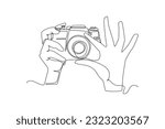Single one line drawing Photographer with camera. World photography day concept. Continuous line draw design graphic vector illustration.