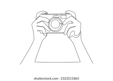 Single one line drawing  Photographer with camera. World photography day concept. Continuous line draw design graphic vector illustration.