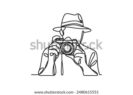 Single one line drawing Photographer with camera. World photography day concept continuous line draw design.