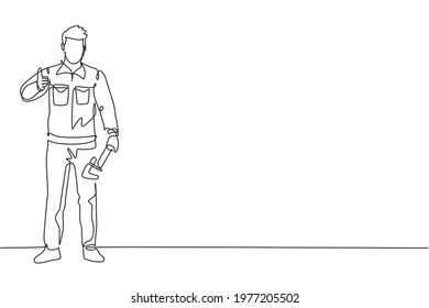 Single one line drawing of plumber stands with the gesture of raising his thumb and holding a carpentry tool fixing a broken plumbing. Modern continuous line draw design graphic vector illustration.