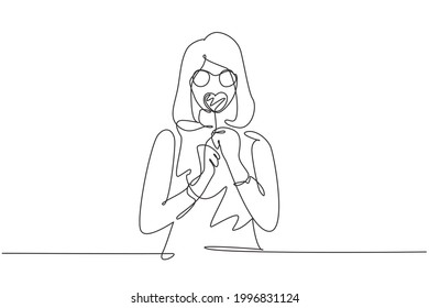 Single one line drawing portrait cool young woman and heart shaped lollipop blowing red lips sending sweet air kiss wearing sunglasses  Modern continuous line draw design graphic vector illustration