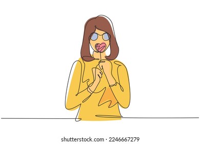 Single one line drawing portrait cool young woman and heart shaped lollipop blowing red lips sending sweet air kiss wearing sunglasses  Modern continuous line draw design graphic vector illustration