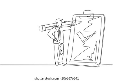 Single one line drawing positive businessman with giant pencil on his shoulder nearby marked checklist on clipboard paper. Successful completion of business tasks. Continuous line draw design vector