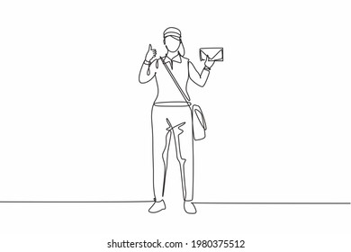 Single one line drawing of postwoman standing in a hat, bag, uniform, holding an envelope, and with a thumbs-up gesture delivering mail. Modern continuous line draw design graphic vector illustration